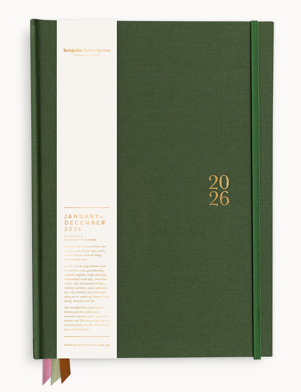A large green hardcover planner with “2026” embossed in gold on the cover.