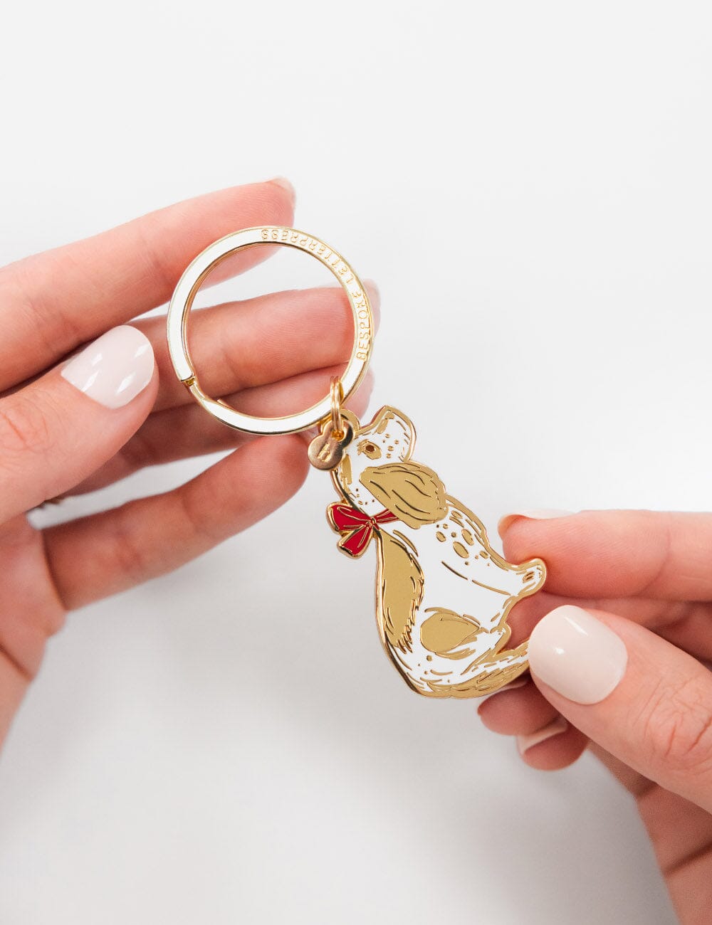 Dog with Bow Enamel Keyring