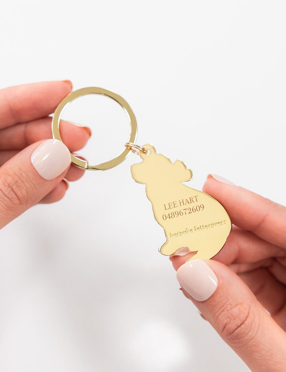 Dog with Bow Enamel Keyring