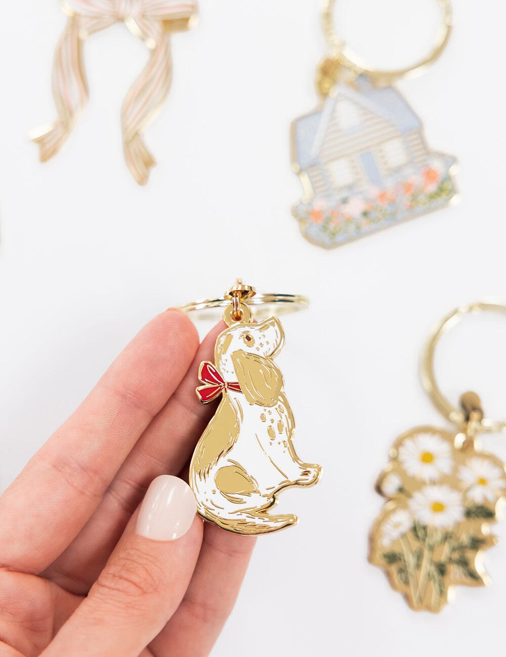 Dog with Bow Enamel Keyring