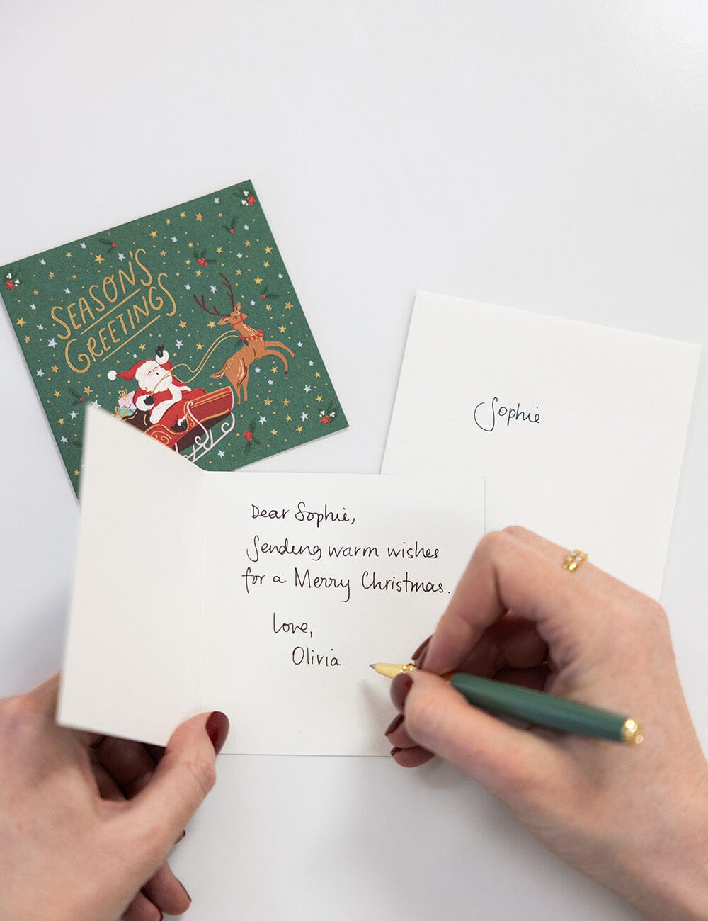 Seasons Greetings Santa Sleigh Square Card